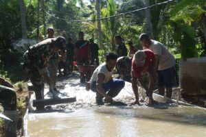 TMMD Ke 128 Kodim 1003/HSS Hidupkan Kembali Semangat Gotong Royong di Desa Pantai Ulin