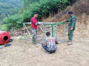Pengecatan Tower Air Jadi Prioritas Satgas TMMD di Desa Patukku